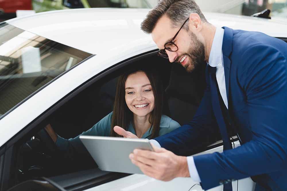 Woman shopping for a car