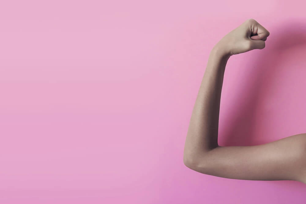 Young woman supporting brest cancer