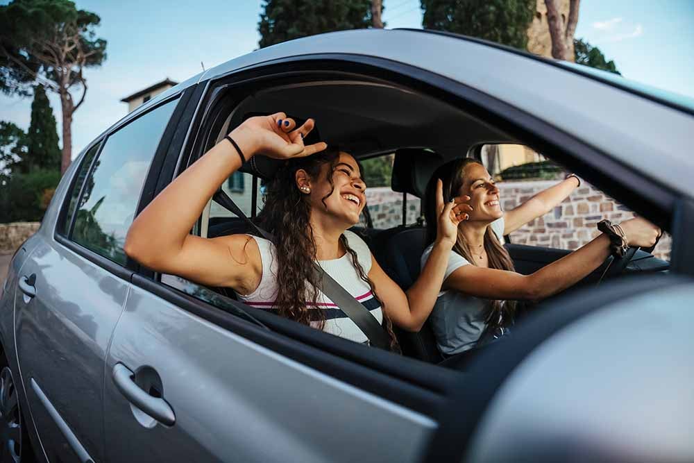 Two young women on a road trip