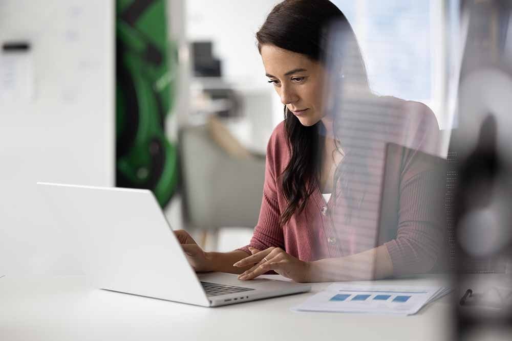 Female accountant working on a laptop