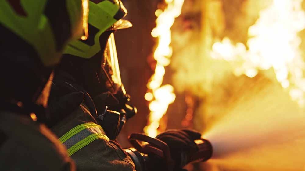 Firemen fighting a house fire