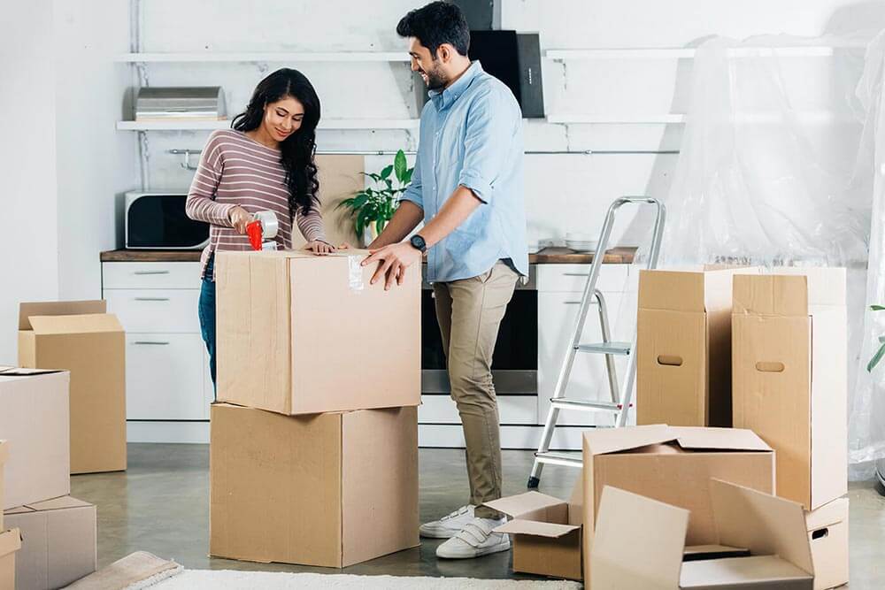 Couple packing up for a move