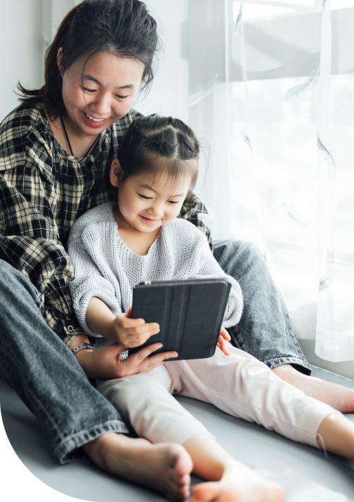 Mother and daughter reading Sonnet newsletter